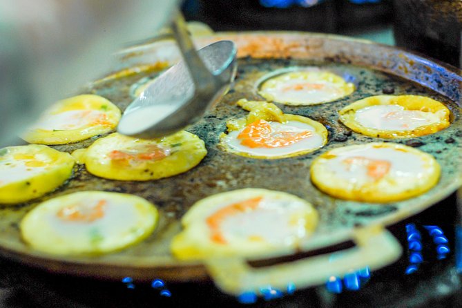 Private Street Food Motorbike Tour in Ho Chi Minh City - District 4 finishes with seafood and flan