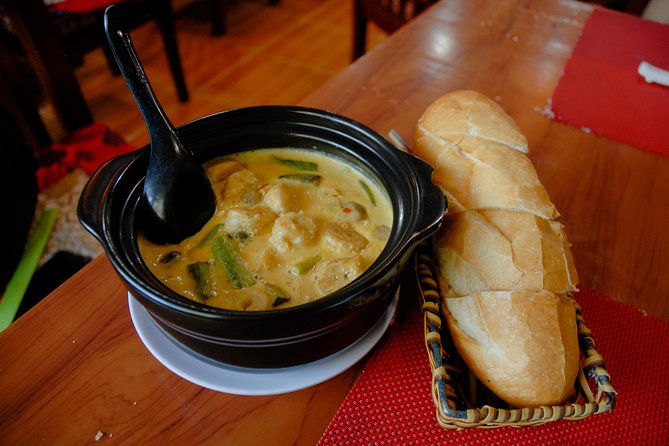 Private Vegan Food Tour By Scooter in Ho Chi Minh City - A restaurant meal shows another side of vegan cooking