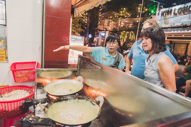 Saigon After Dark Night Tour by Scooter + 7 tastings - Nguyen Thien Thuat apartment buildings and street food