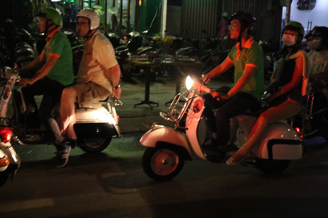 Saigon After Dark Vespa Street Food Tour + Live Music 4 hours - Banana cake and a closer look at street food
