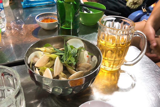 Saigon By Night and Street Food By Motorbike | Opt: Ao Dai Riders - Why a scooter is the right way to see Saigon after dark