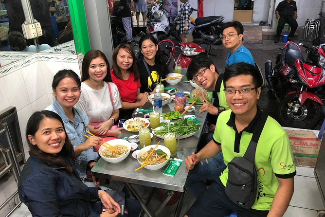 Saigon By Night and Street Food By Motorbike | Opt: Ao Dai Riders - Nguyen Van Cu Bridge and a rare quiet pause