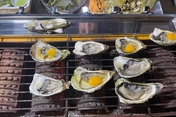 Saigon By Night and Street Food By Motorbike | Opt: Ao Dai Riders - What the food program is really worth at $37