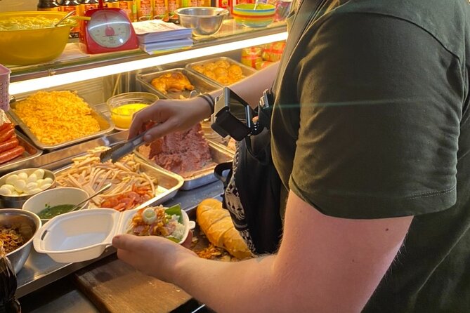 Saigon by Night: Private Street Food Walk You Can’t Miss - A walk through District 3 after dark