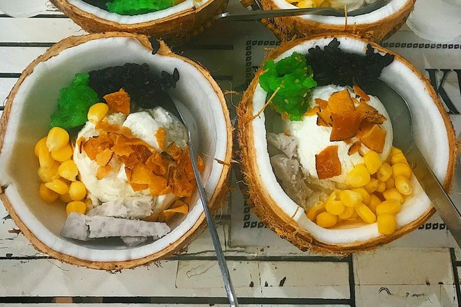 Saigon Evening Food Tour by Scooter - Cooking your own rice pancake
