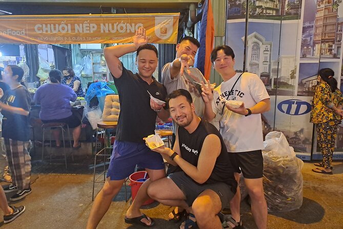 Saigon Food Tour by Scooter with Eleven Tastings - Ho Thi Ky Flower Market adds color and snacks