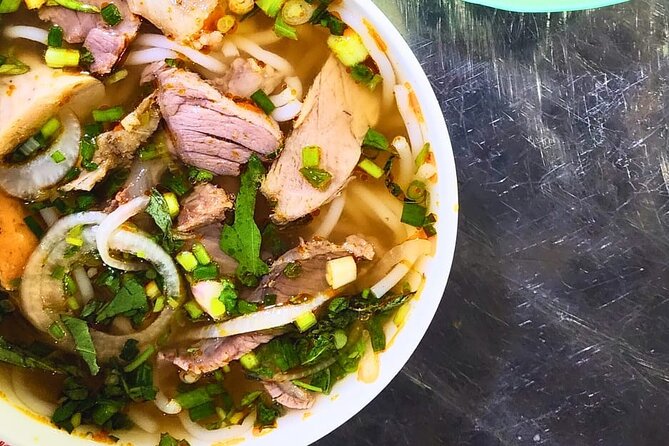 Saigon Food Tour by Scooter with Eleven Tastings - District 5 serves the classic bánh mì