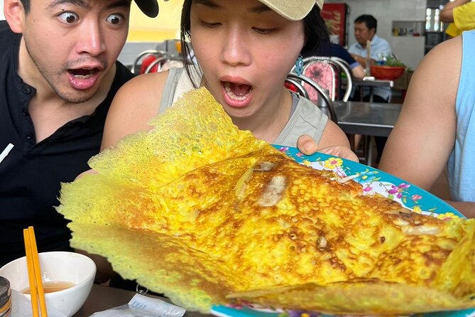 Saigon Food Tour by Scooter with Eleven Tastings - District 3 begins with banana sticky rice