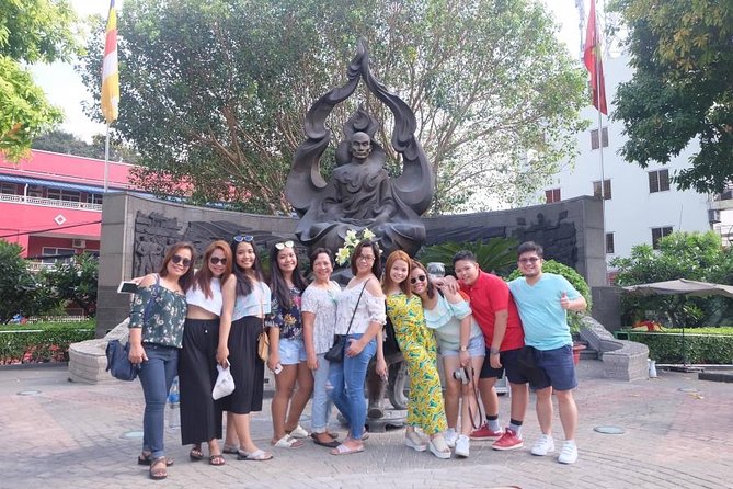 Saigon Morning City Historical Scooter Tour w Ao Dai Rider option - A quieter pause at the Jade Emperor Pagoda