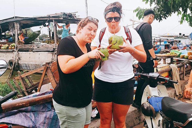 Saigon Night Sights & Local Food by Motorbike| Opt: Ao Dai Riders - Guides make the difference