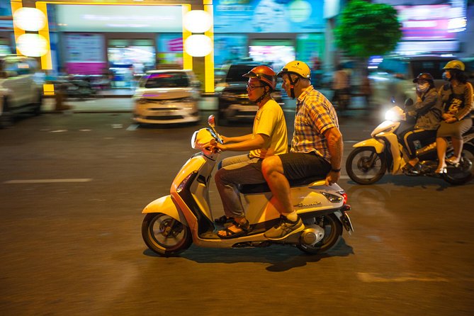 Saigon Night Street Food and City Tour on Scooter - Stop three: Vietnamese-style street barbecue