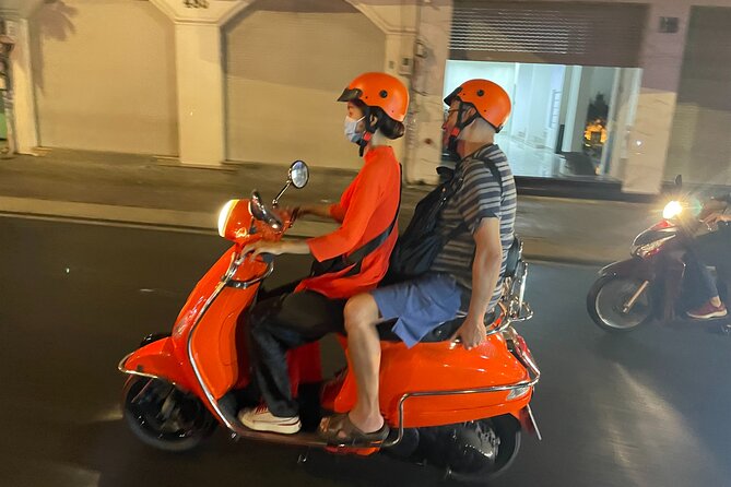 Saigon Vespa By Night Street Food With Female Riders Ao Dai - Seafood and local drinks at the first stop