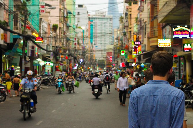 Small group Saigon Inside Out by Motorbike for 3 Hours - Saigon’s theater and the city beyond the postcard sights