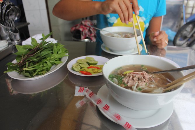 Small-group Street Food Lover by Motorbike (04 hours) - Starting at 1:00 p.m. or 6:00 p.m.
