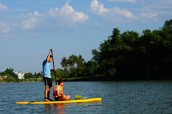 Stand Up Paddle Boarding and Sunset Watching on Cai River - Watching sunset from the water