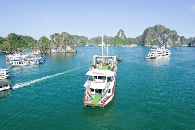 Sweetness Cruise Ha Long Bay: Caves, Kayaking, Swimming & Lunch - Sunset, fruit, music, and the onboard jacuzzi