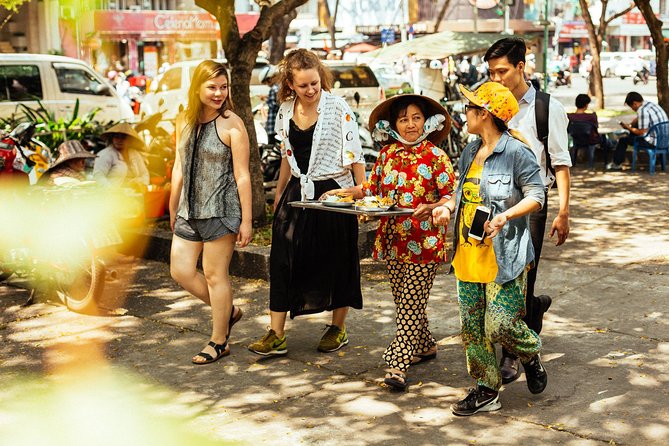 The 10 Tastings of Ho Chi Minh City With Locals: Private Street Food Tour - Tan Dinh Church adds a colorful final stop