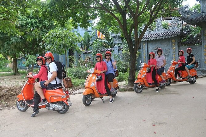 The insider's Hanoi + Train Street 4,5 Hours Female Ao Dai Riders - Ba Dinh Square and Hanoi’s major landmarks