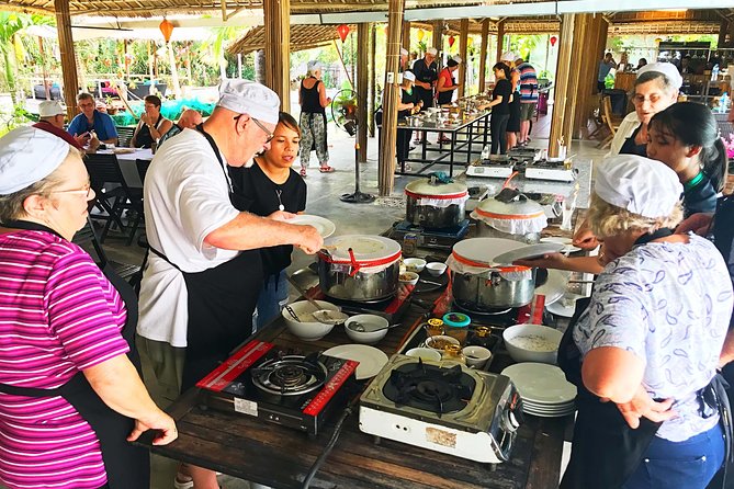 Traditional Cooking Class with Basket Boat Ride and market Tour - Herbal foot soak and massage before the meal