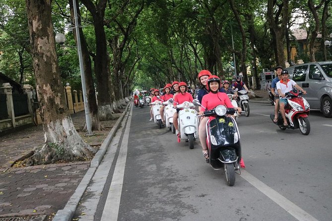 Vespa City Tour &Train Street Female With Ao Dai Riders 4,5 Hours - Starting with a hotel pickup and safety briefing