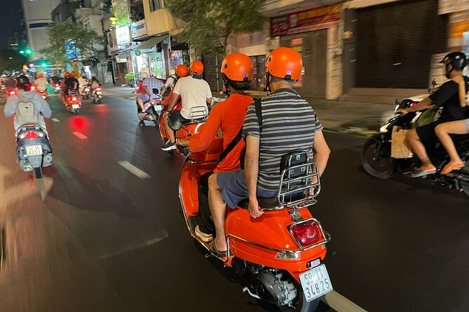 Vespa Female Ao Dai riders Night Street Food + See Train Street - Safety, comfort, and the rhythm of the ride