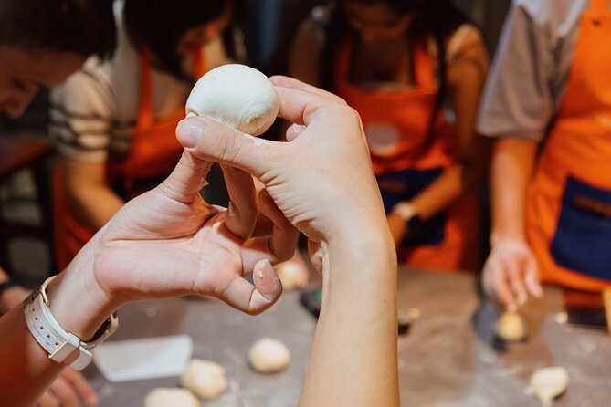 Vietnamese Bread & Brew: Banh Mi Baking Class & Specialty Coffee - Sitting Down to Eat Your Own Banh Mi