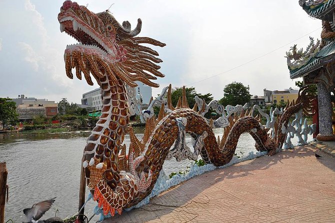 VIP Tour in Dragon Floating Temple sightseeing by SpeedBoat - Cruising Thanh Da Island with coconut juice and fruit
