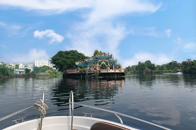 VIP Tour in Dragon Floating Temple sightseeing by SpeedBoat - Saigon Bridge, New Saigon Port, and the city from the river