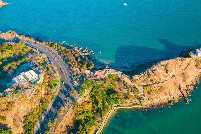 Vung Tau Full-Day Tour with Beach, Christ Statue & White Palace - Photographing Nghinh Phong Cape and the Gate of Heaven